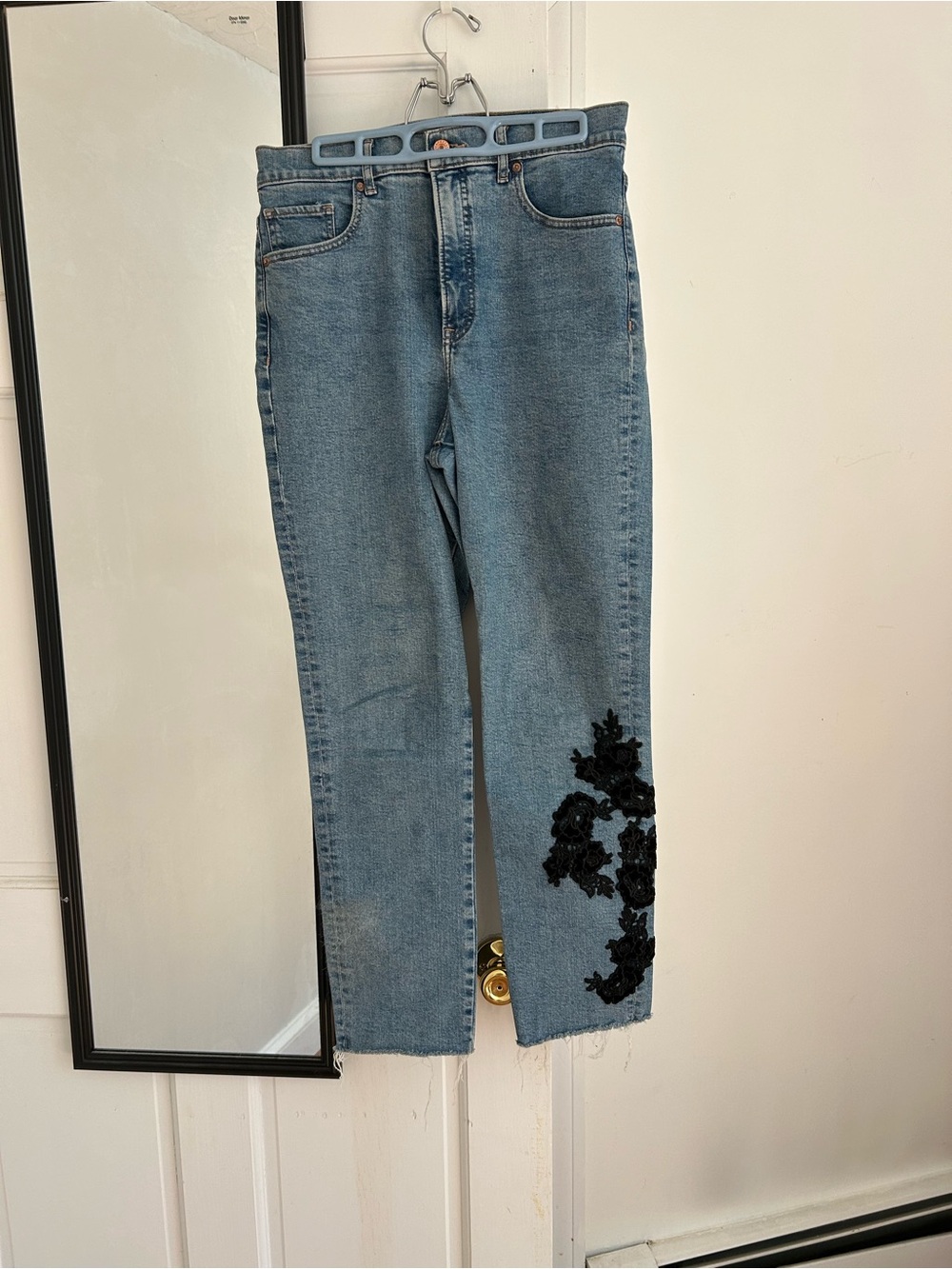 Express Light Blue Straight Leg Jeans with Black Floral Appliqué